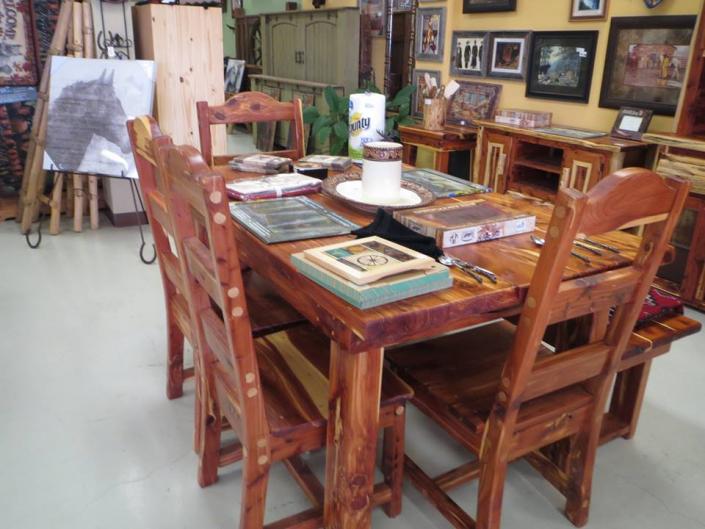 This breathtaking kitchen table is characterized by it's red yet natural look!